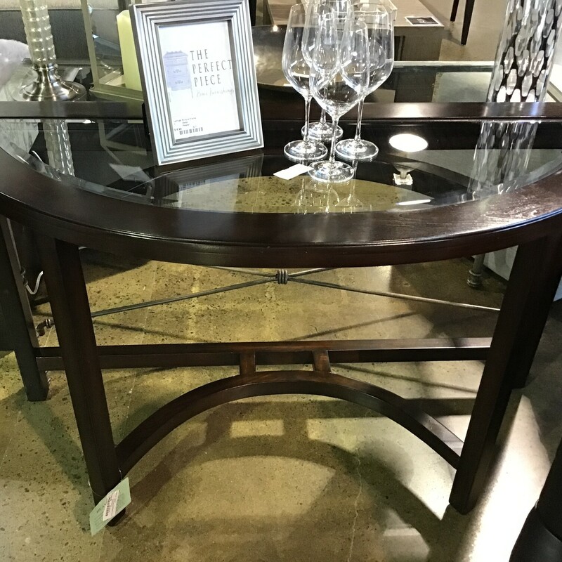 This pretty demilune table features a wooden insert with glass insert. It has curvy lines and would be great as a wall table or behind a sofa.
Dimensions are 50 in x 20 in x 30-1/2 in