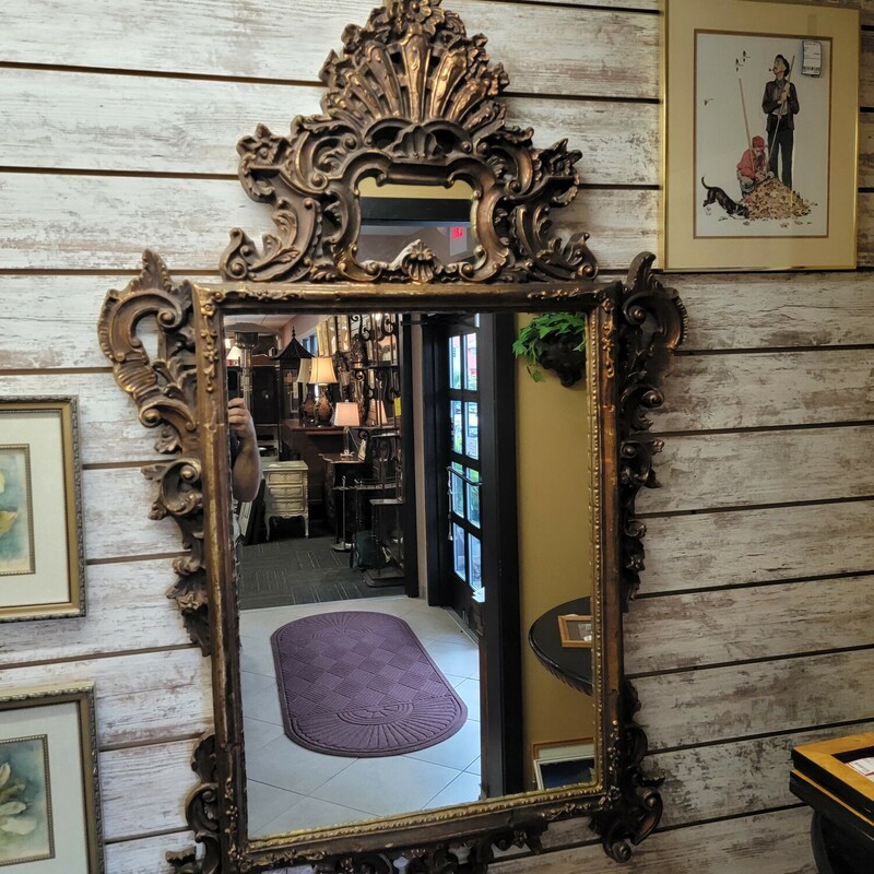 Large Decorative Mirror in excellent condition.  Measures 40' wide; 62' tall.