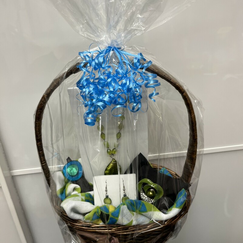 This Custom Made $70 Value Gift Basket comes with A Green Beaded Necklace & Earring Set,<br />
Green and Aqua Scarf,<br />
Matching Ring and Brooch<br />
All Brand New Items pulled together Beautifully in a Brown Basket Ready to Gift to someone special! Local Delivery is available upon request.