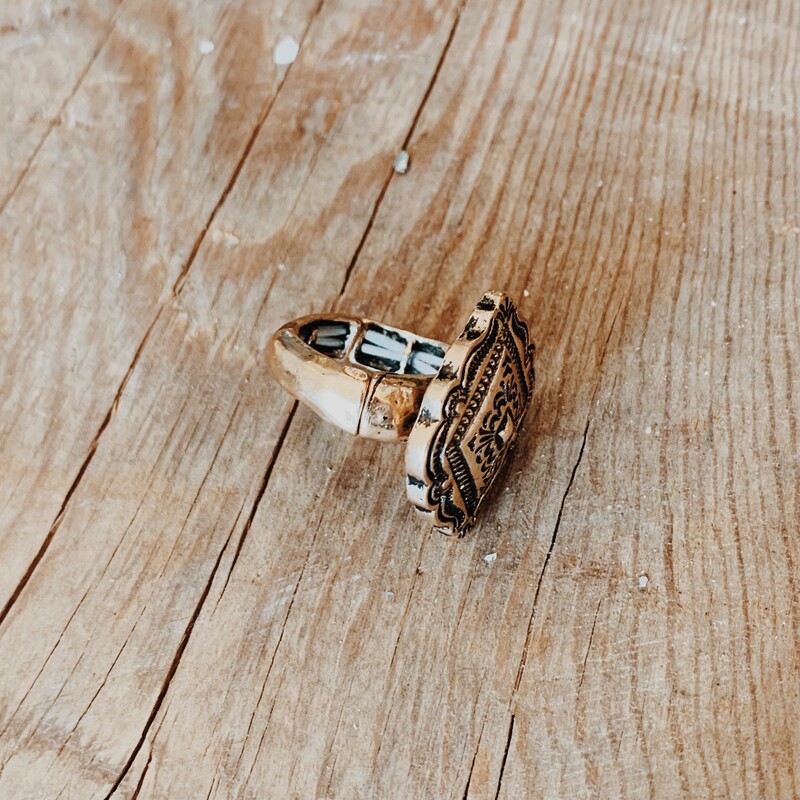 This brass, diamond shaped ring is on a stretchy band for flexible sizing!