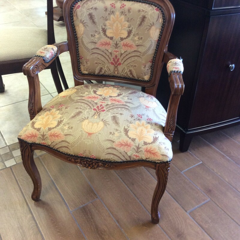 This adorable French Arm Chair is upholstered in luxurious brocade fabric.