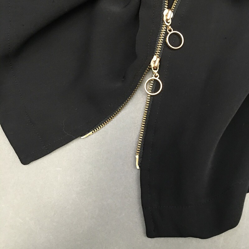 Calvin Klein Zip Shirt, Black, Size: 10<br />
Up down gold front zip, gold snap closure fron breast pockets, adjustable gold snap 3/4 sleeves, cute tie as belt or necktie, 100% polyester.Dry clean only.<br />
1 lb 1.1 oz