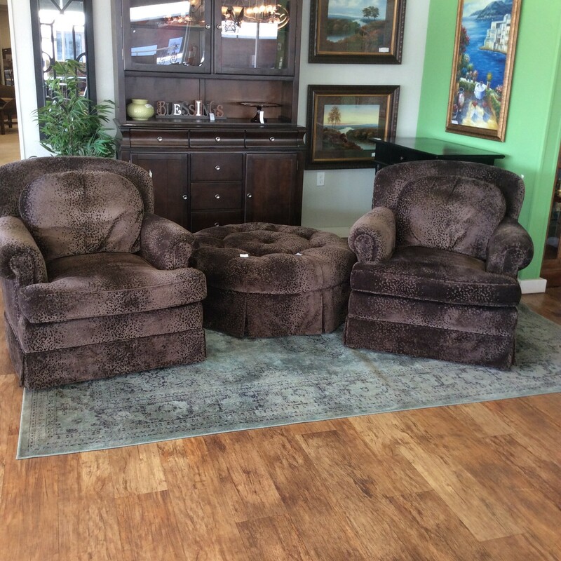 This pair of chairs and ottoman form Kisabeth is uplohstered in a chocolate sculpted chenille fabric.