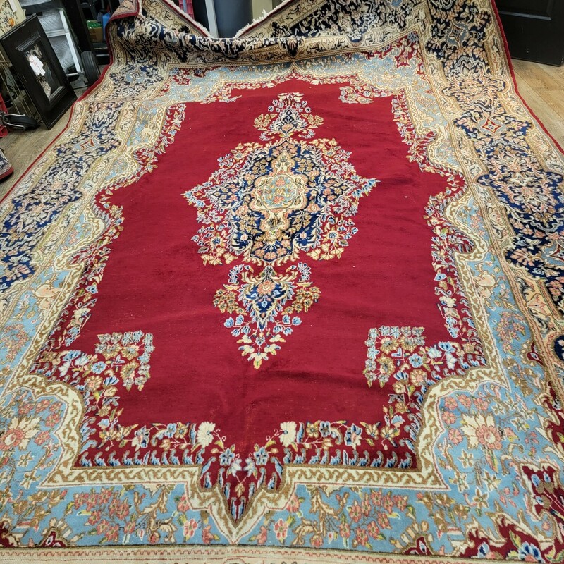 Large Red Hand Woven Wool Persian Carpet in fair condition.   Shows signs of wear; typical of age.  Measures 9'7' wide; by 16'2'.