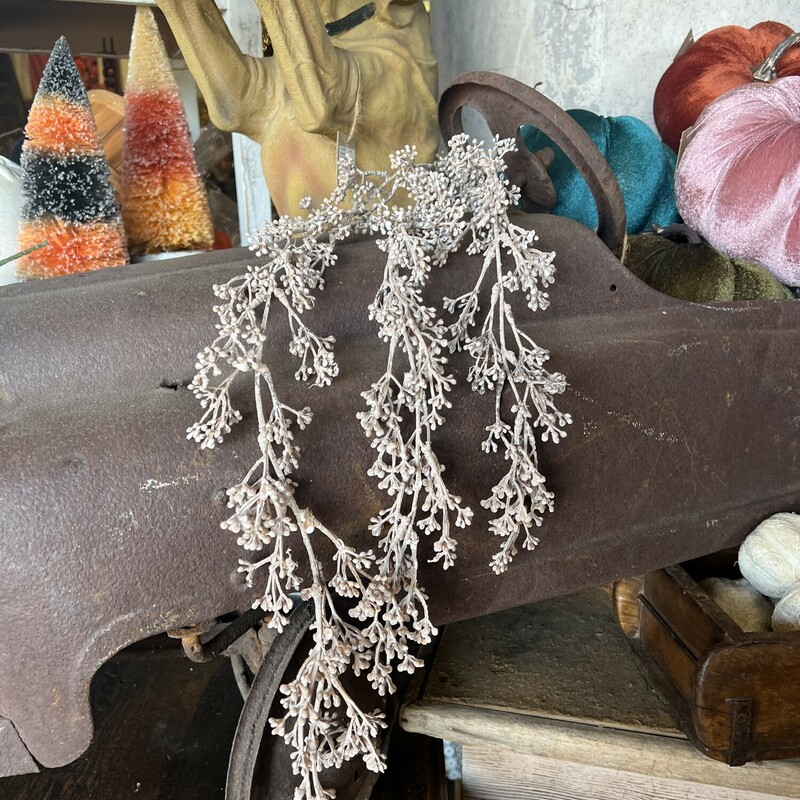 Add a subtle, delicate accent to displays with the Dried Berries Spray. This 41 inch long hanging spray features the look of many tiny dried berries. It makes a lovely accent around sitters and freestanding signs or add to other floral displays for a fun, dried texture.