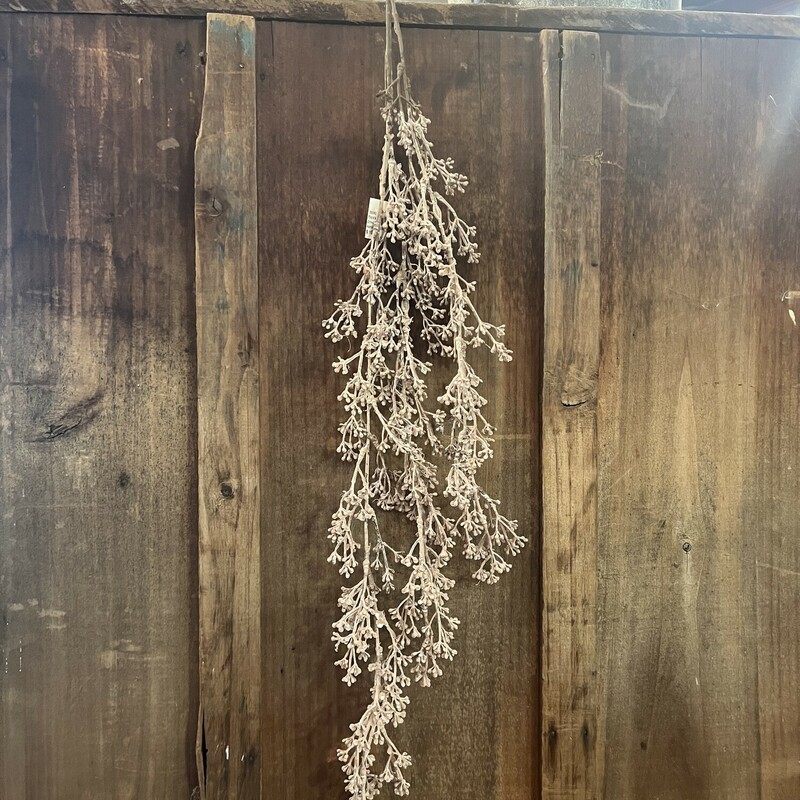 Add a subtle, delicate accent to displays with the Dried Berries Spray. This 41 inch long hanging spray features the look of many tiny dried berries. It makes a lovely accent around sitters and freestanding signs or add to other floral displays for a fun, dried texture.