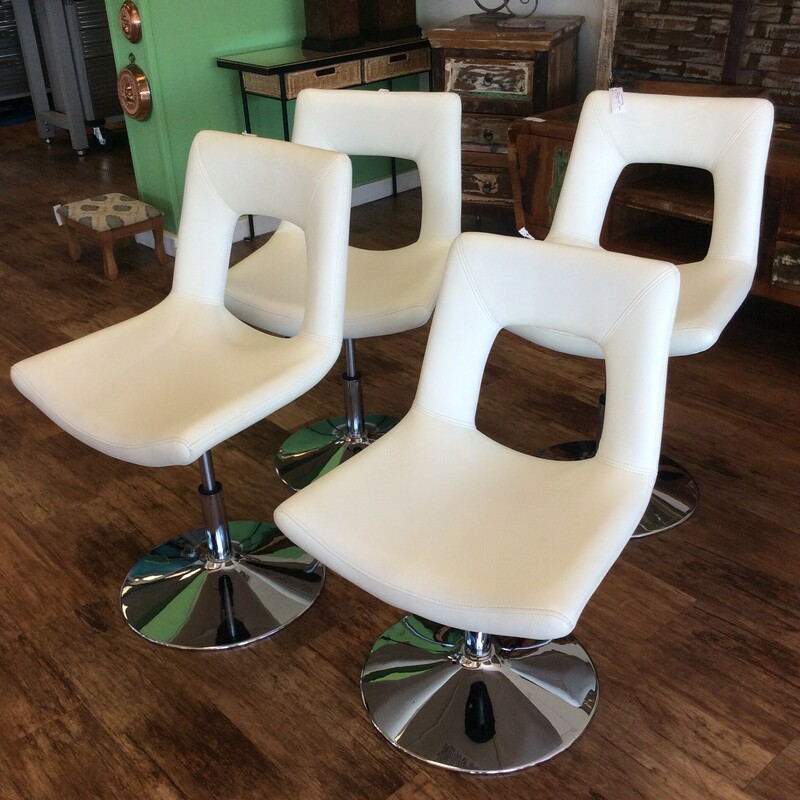 This is a set of 4, white leather, adjustable barstools with a chrome bottom.