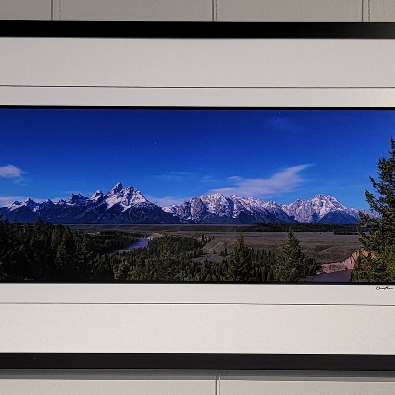 Tetons By Moonlight
Photography
Chris Tolton
Size: 19 X 32 Framed
The Teton Range from the Snake River overlook, in Grand Teton National Park. This photograph is a composit of 4 images taken to form the  panorama, which were taken at midnight under a full moon in early June. The image has exceptional detail.
An unframed version is also available.