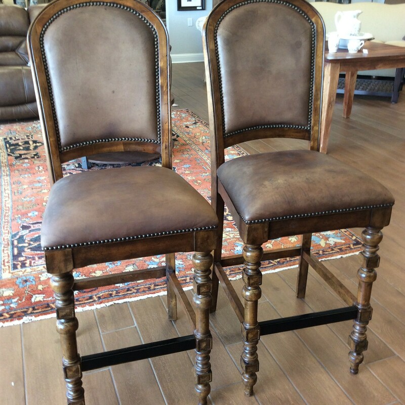 This is a pair of beautiful wood and leather Bernhardt Barstools.