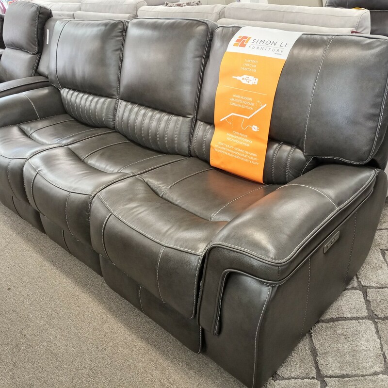 Grey Leather Power Sofa w power headrests. Cool gray color with a little contempo style.