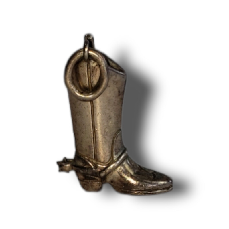 Tiffanny & Co Small ilver Boot Charm<br />
<br />
925 Sterling Silver<br />
<br />
Size: Charm