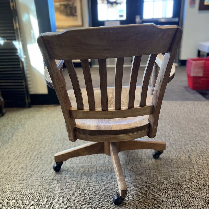 Rustic wooden office chair.

The perfect furniture piece for your office!

Rustic light wood office chair with rolling wheels.

There is a small green mark on the arm.

There is minor wear and scratches on the chair.

19in tall (seat to floor) x 20in wide x 34in tall x 17in deep