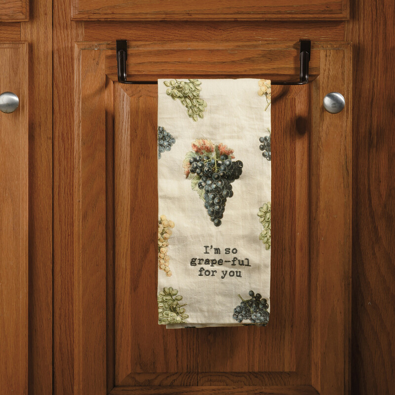 Dish Towel For You, SKU: 108974<br />
A cotton linen blend kitchen towel featuring all-over retro style grape bunch designs and punny embroidered I'm So Grape-ful For You sentiment. Features a cotton tape loop in the corner for easy hanging. Machine-washable. Towel is packaged on a cardboard hanger with a hole to easily hang on rack. Features a hangtag displaying the full design.<br />
DETAILS<br />
Dimensions: 18 x 28<br />
Material: Cotton, Linen<br />
UPC: 190134089740<br />
Artist: Annie Schickel<br />
Product Text: I'M SO GRAPE-FUL FOR YOU