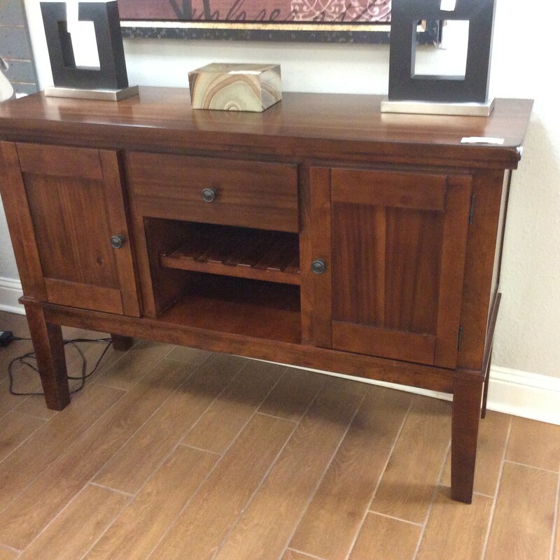 This is a beautiful wood buffett with 2 cabinets, 1 drawer and a wine cubbie.