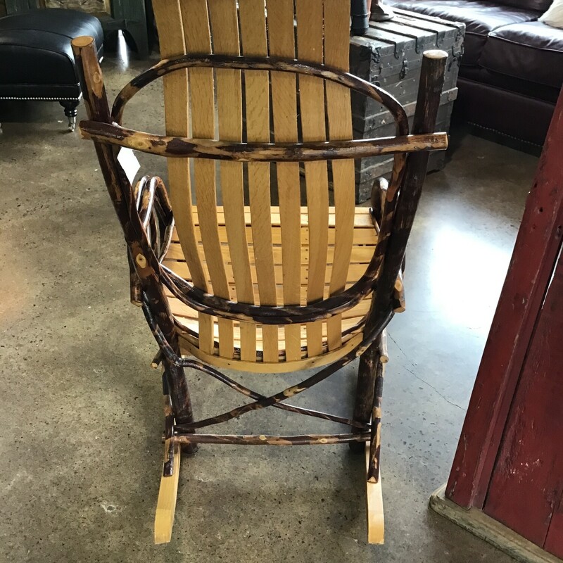 Crafted of rugged, solid hickory and oak, this Amish Hickory Rocker offers remarkable style in a comforting, graceful design that is sure to become the favorite seat of your home décor. Expertly handcrafted by Amish woodworkers , this piece will not only look beautiful today, but for years down the road as well. This traditional rocker features a slat-back with comfortable contours and wide armrests. The durable construction includes oak wood for extra stability, ensuring that this timeless rocker with stand the test of time.

Dimensions: 21x33.5x42