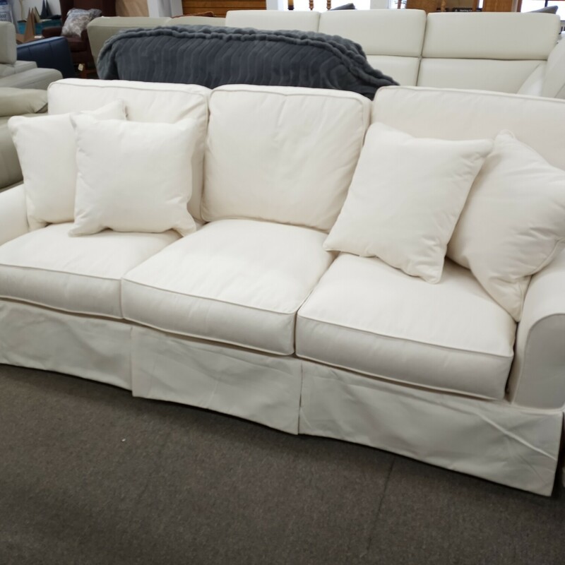 Well Made Slipcover Sofa

    Color: Cream
    Stain-resistant, Removable LiveSmart® Performance Fabric Slipcovers
    Eight-way Hand-tied Seating Construction
    Includes Four Matching Pillows
    Classic Roll Arm