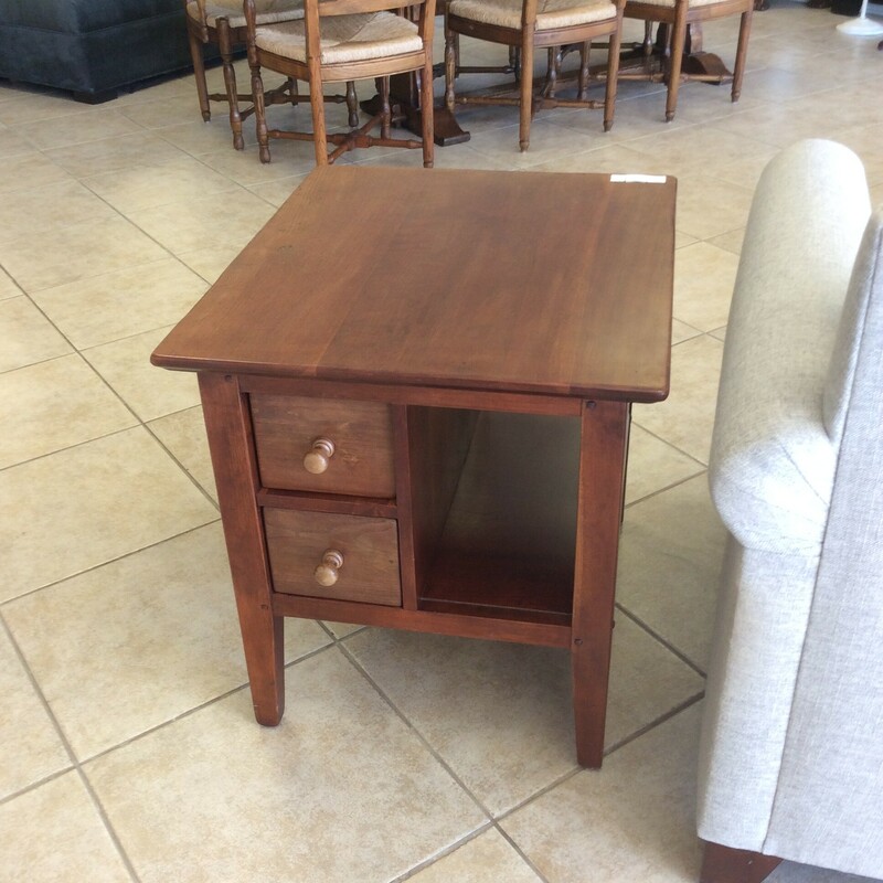 This unique Cherry Wood Side Table has two pass thru drawers that slide out from the front, as well as , the back of the table.