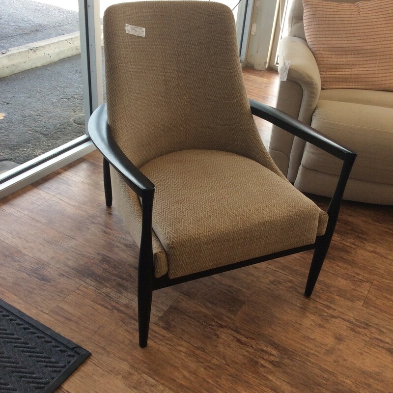 This chair by Bernhart is upholstered in a grey tweed fabric with nailhead trim.