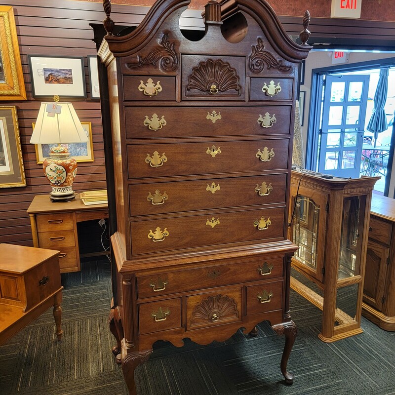 2 pc Mahogany Highboy by Thomasville in excellent condition.  Qaulity piece dovetailed joints and solid Oak secondary woods.  Measures 37' wide; 19' deep; 84' tall.  Finials come off for easy transportation.