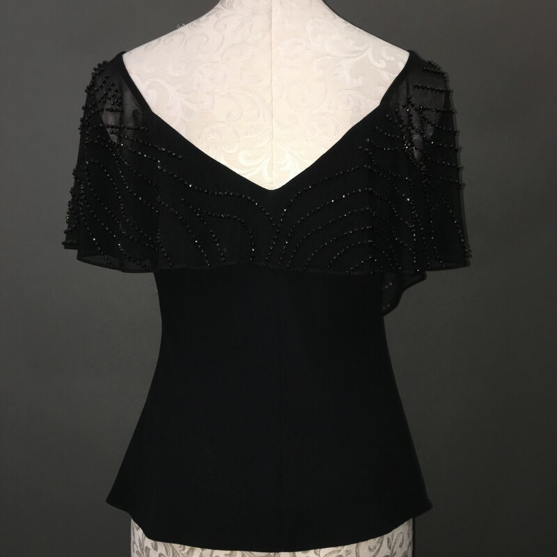 S. L. Fashions Beaded, Black, Size: 10<br />
Vintage Evening Blouse, mesh detial with solid black beading<br />
Pull over, 100% polyester,off the shoulder top.<br />
<br />
9.5 oz