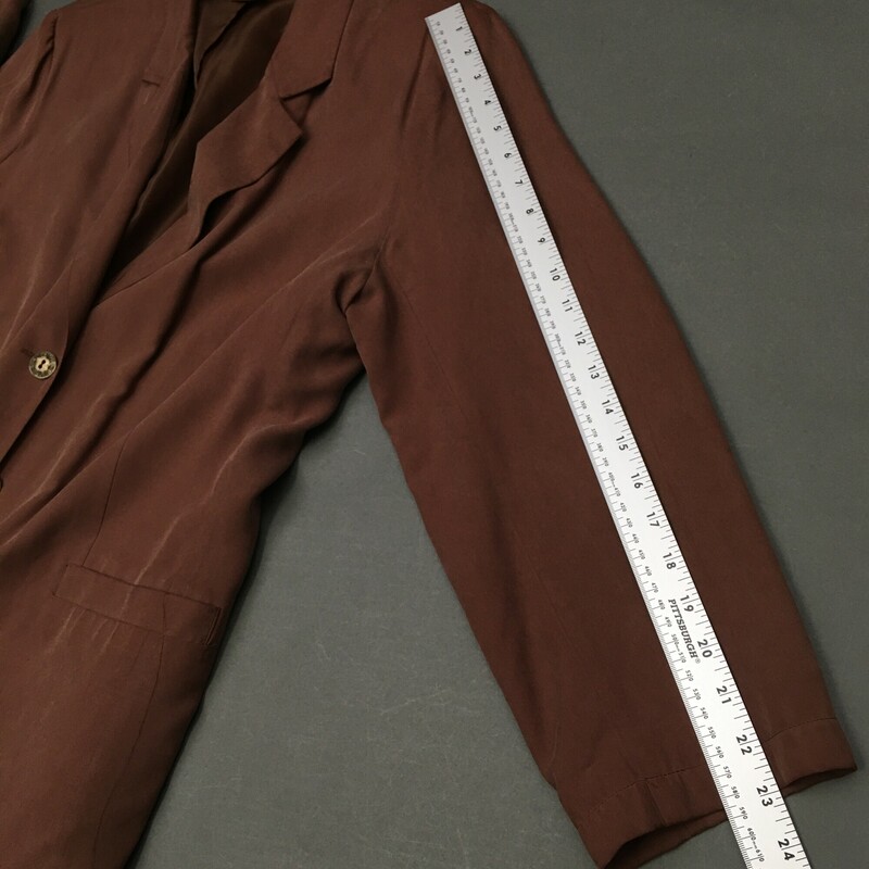 Melrose Studio Silk, Brown, Size: Large<br />
100% lined silk jacket with three bronze/gold buttons.<br />
 front pockets only. Lining is nylon<br />
10.8 oz