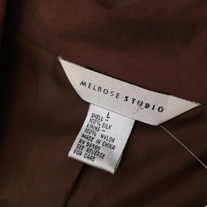 Melrose Studio Silk, Brown, Size: Large<br />
100% lined silk jacket with three bronze/gold buttons.<br />
 front pockets only. Lining is nylon<br />
10.8 oz