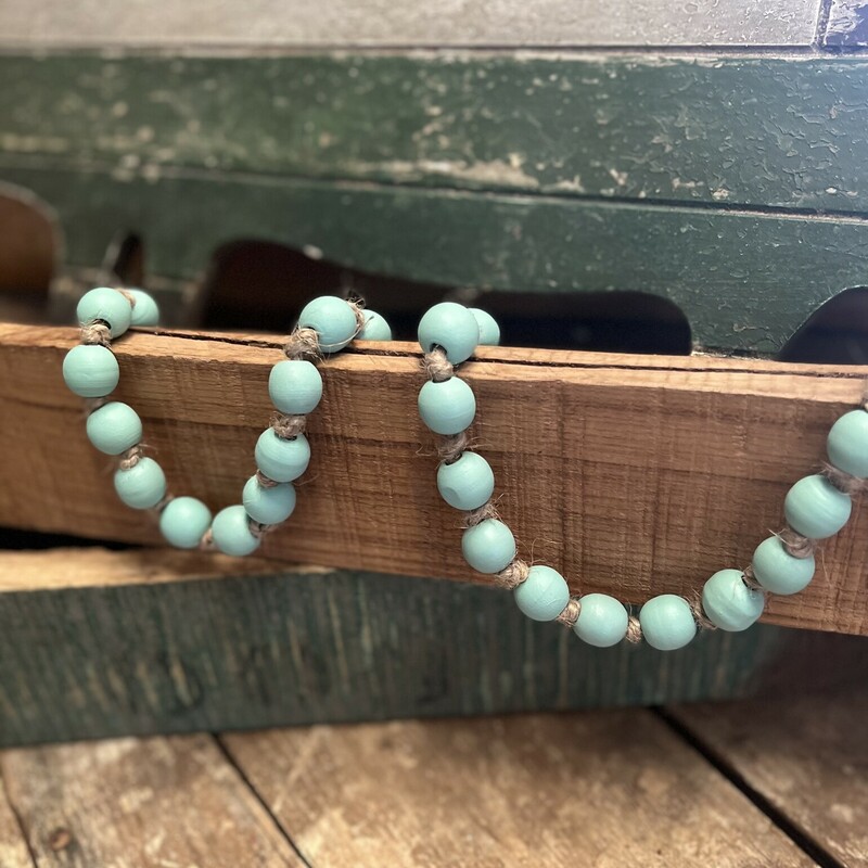 Beautiful Mint Green Beads are made of wood and are the peerfect final touch to any decor. Strand measures 38 inches in length