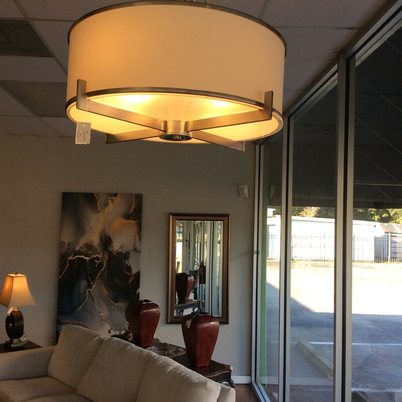 This pair of large contemporary drum shade pendants has a brushed  nickel finish.