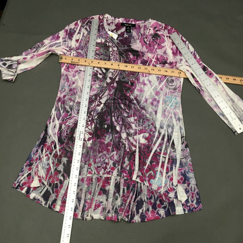 Style & Co Droptail Floral, Pattern, Size: M<br />
Purple and grey floral pattern withmagenta and silver sequin stud pattern on front.  Print design on fabric leaves white areas. Shirt is 100% polyester and longer in back.<br />
6.4 oz