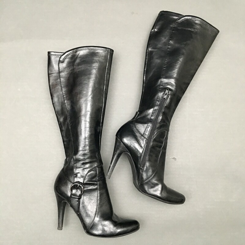 Mark Fisher, Black, Size: 6<br />
Black Patent Gilmore Heeled Boots<br />
Black Vegan Patent leather boots by Marc Fisher. Side buckle embellishment. Inner half zipper closure<br />
Hits just below the knee. 4\" heel. 19\" from ball of foot to top of boot.<br />
Please see all photos. These heels have a dent in the right heel. Sold as is.<br />
1 lb 3.9 oz