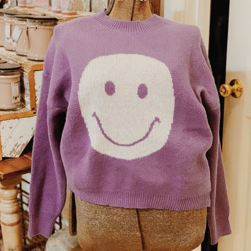 These adorable, purple sweaters are perfect for fall and winter! They are a thicker material and have a smiley face on the front!