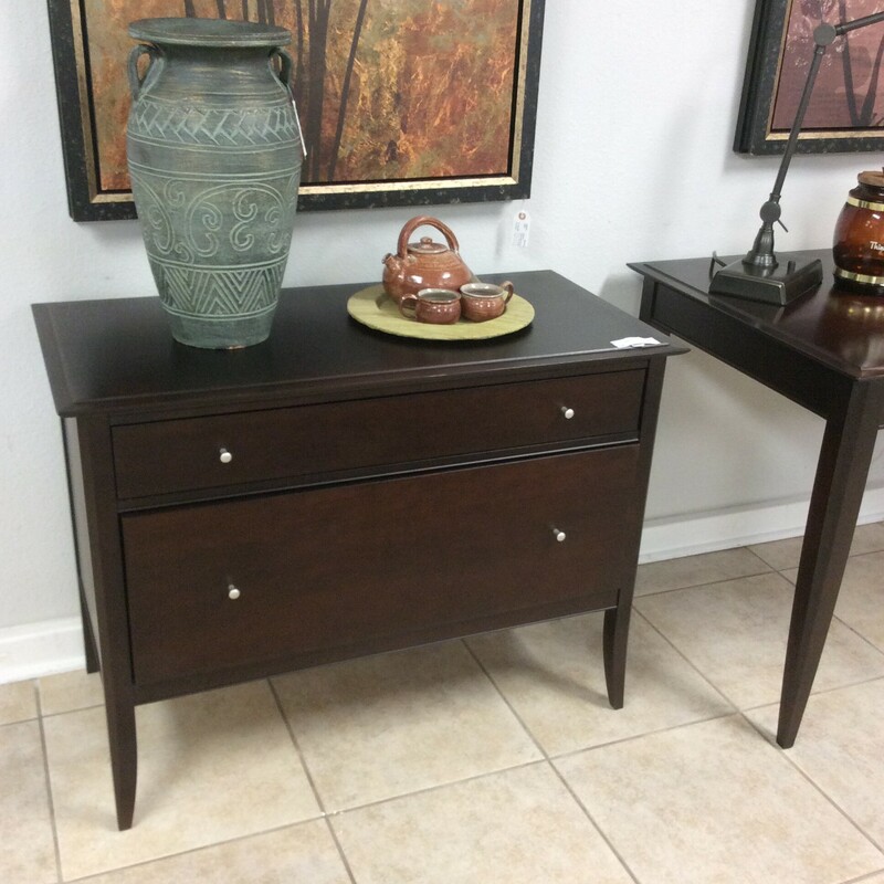 This is a Baronet Credenza with 1 standard drawer and a file drawer.