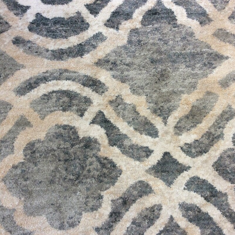 This is a beautiful gray and cream Karastan Euphoria rug.