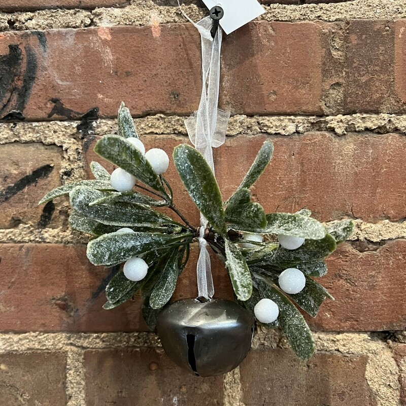 The Sparkle Mistletoe Bell Ornament brings elegance and charm to any tree. The cute bell is attached to a sheer fabric bow and is accented by sparkling glitter coated leaves and white berries.  Pair it with any gold; white or silver ornaments for a warm and inviting winter display
Measures 4 and a half inches high and 6 inches wide