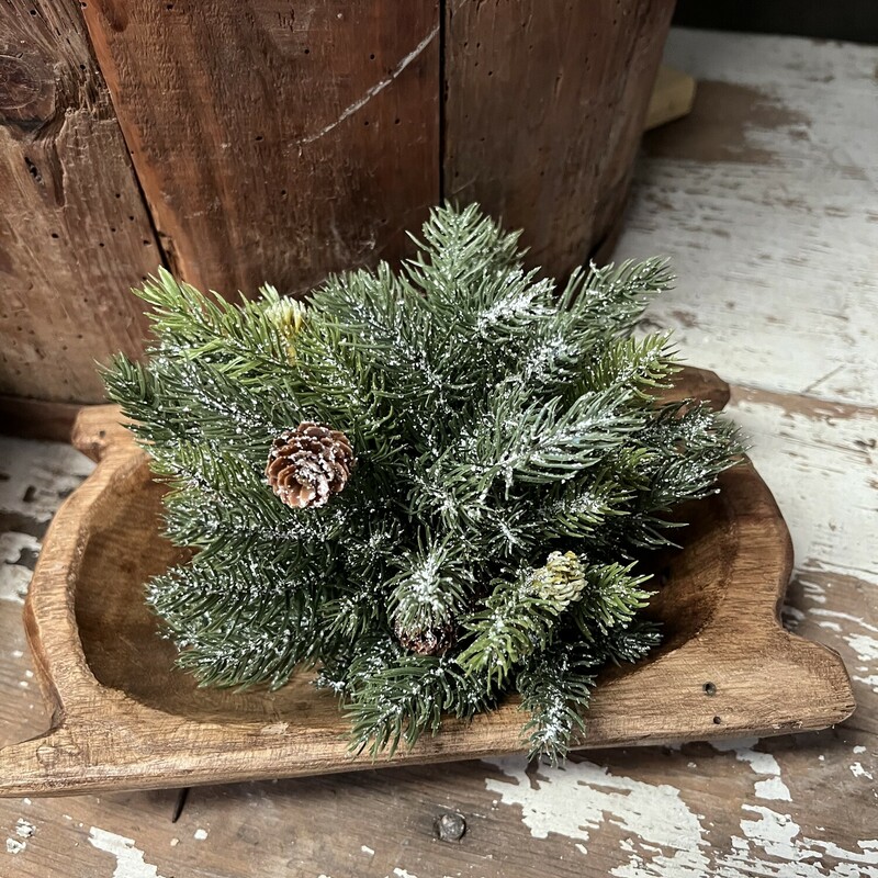 Frosted Spruce Half Sphere is peppered with artificial snow; plastic pine needles and has a dimensional look.  This half sphere rests well on a tabletop ; dough bowl or urn. Several pine cones are nestled among the snowy greenery and will add a classic touch to any decor. The sphere measures 8 inches in diameter