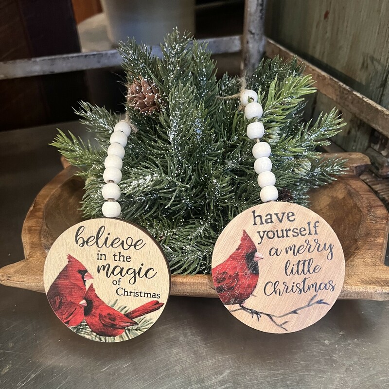 Brighten any tree or holiday decor with these Cardinal Bead Ornaments. The round, wood ornaments feature white beads and jute hangers. Ornaments have two different sayings and are 3 inches in diameter and are 7 inches long