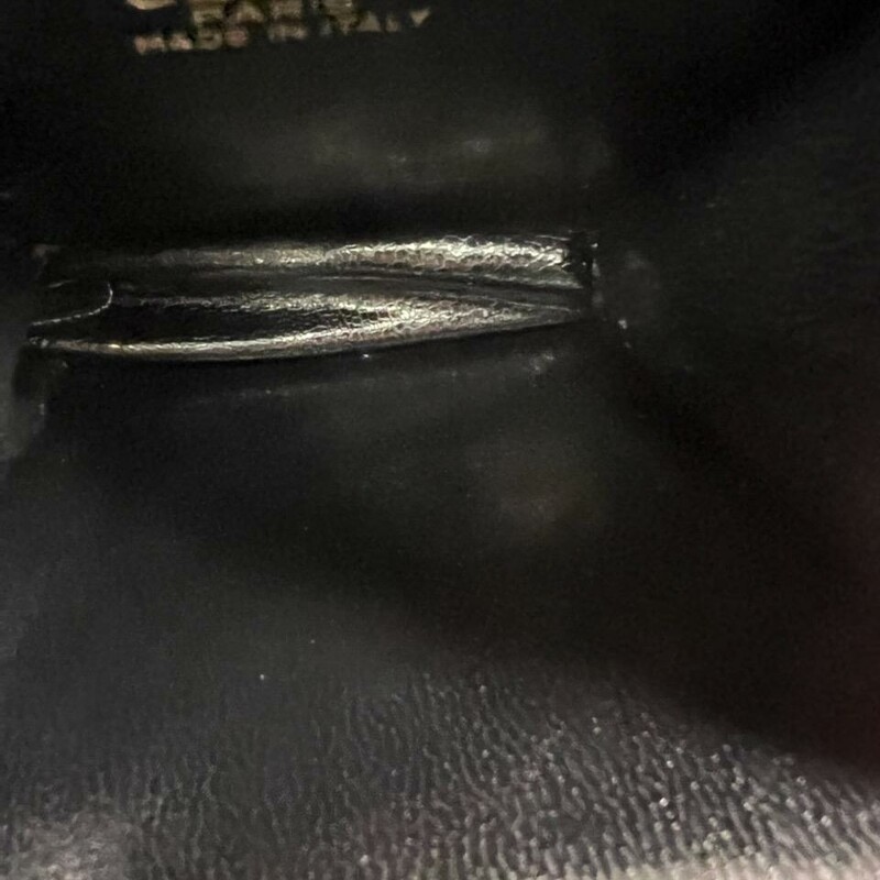 CELINE COIN PURSE<br />
Navy C Monogram<br />
leather trim<br />
gold hardware with snap closure<br />
in excellent condition<br />
size 3X4<br />
Comes with Certificate of Authenticity