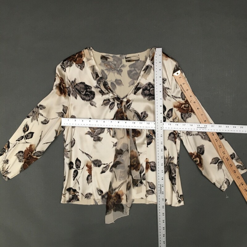 Don Caster Satin Silk, Pattern, Size: M, Womens
Cream sation silk fabric with brown, black and grey floral pattern,
pullover, side zip,  sheer fabric/bow laced through neckline of blouse. Although the fabric has same design cut for cuffs, there are no ties for cuffs.
4.8 oz