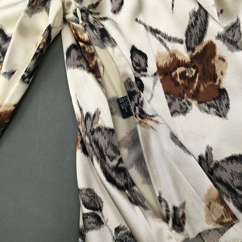 Don Caster Satin Silk, Pattern, Size: M, Womens<br />
Cream sation silk fabric with brown, black and grey floral pattern,<br />
pullover, side zip,  sheer fabric/bow laced through neckline of blouse. Although the fabric has same design cut for cuffs, there are no ties for cuffs.<br />
4.8 oz