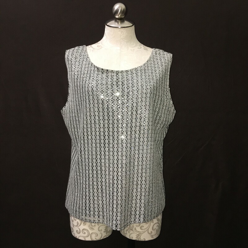 Sharade Nites Knit, Silver, Size: Large Womens
Vintage 2 piece metalic silver and black knit with silver sequins sweater set, Sleeveless tank,  long sleeved open front cardigan with single collar button. Very nice condition. Acrylic blend
11.5 oz
