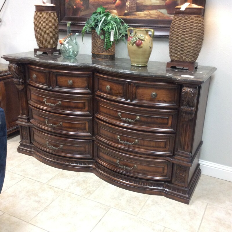 This is a beautiful wood with granite top, 8 drawer Fairmont Dresser.