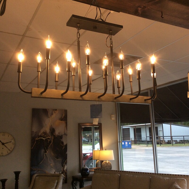 This 16 candle Modern Farmhouse style Chandelier is done in weahthered wood and matte black metal.