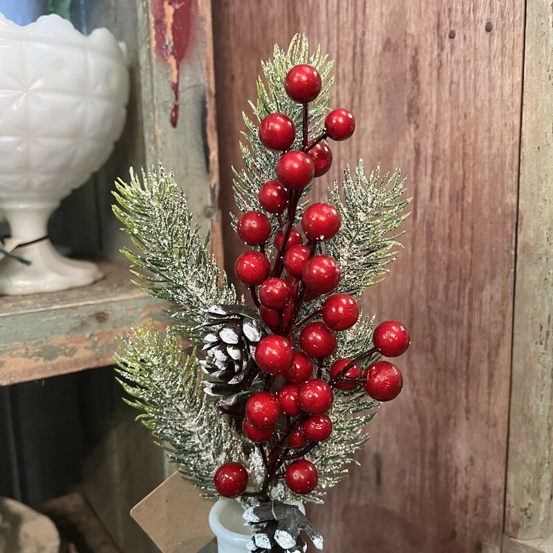 The Berry And Pine Stem measures 17 inches high.
Its mixture of berries, pinecones and snowy greenery with just a touch of gliter make this a perfect stem to just drop in any vase