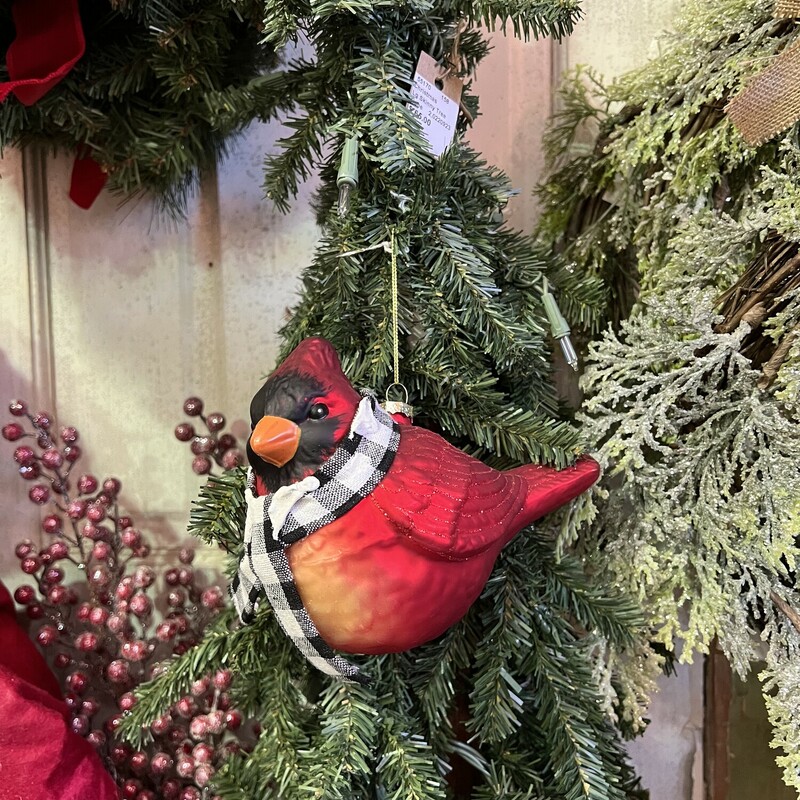 Beautiful glass Cardinal ornament with a cute litte checked scarf and just a touch of glitter.  This large  ornament would look pretty on any tree
Measures