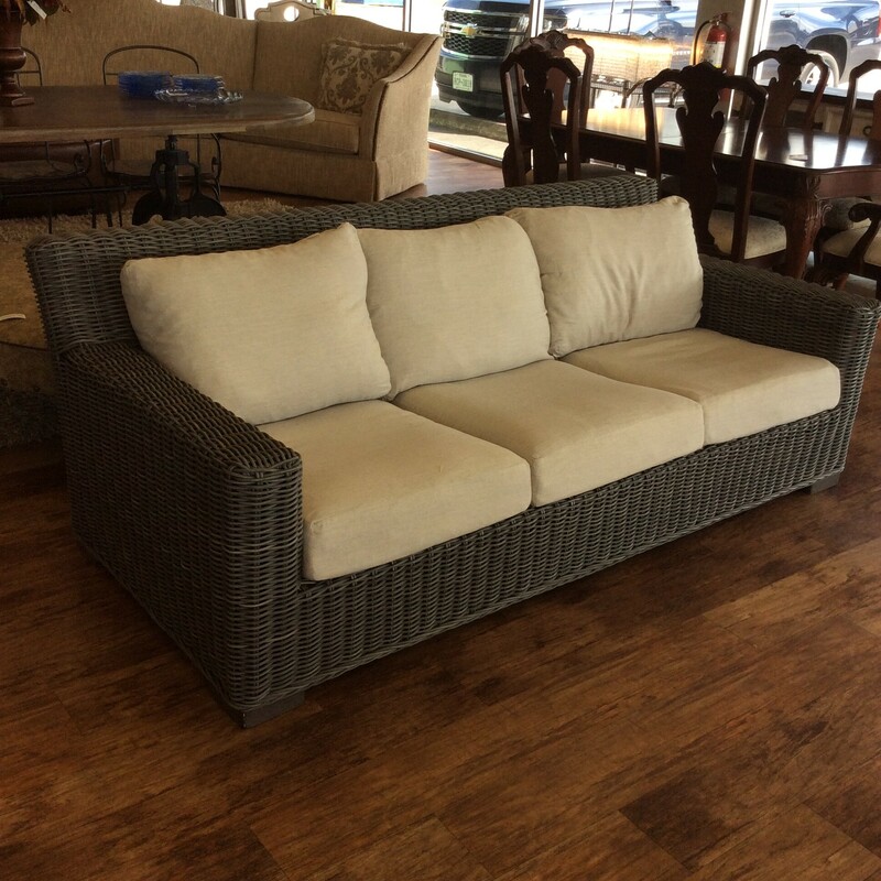 This outdoor sofa by Summer Classics has removable cushions and is done in a nutmeg color.