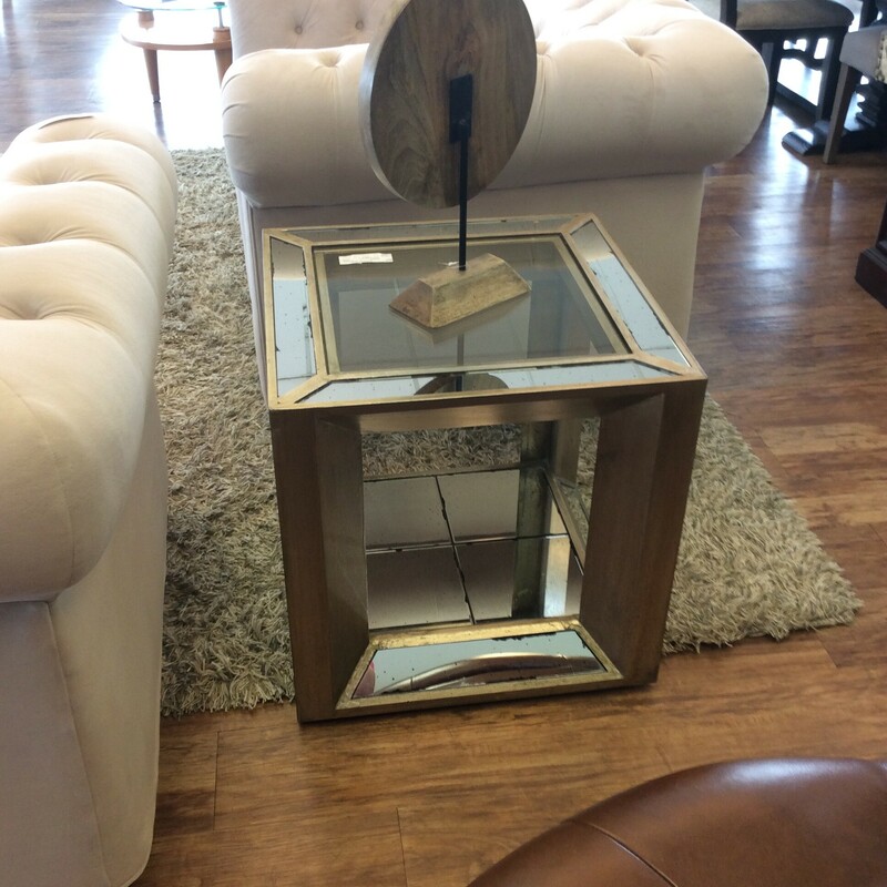 This is a ZGallerie mirrored, gold and silver, End Table.