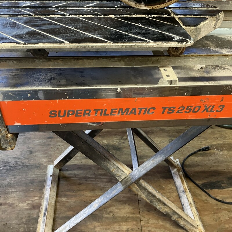 Wet Tile Saw, Husqvarna,  TS 250 XL3<br />
Stainless Steel Pan<br />
<br />
<br />
<br />
Built for the professional who performs high production sawing, the Husqvarna Super Tilematic TS 250 X3 is designed to cut big tiles and to deliver the required cutting power. The sliding water pan allows instant adjustment form small to large material for unequaled productivity and convenience.<br />
<br />
<br />
Features<br />
<br />
<br />
<br />
Patented sliding tray design allows maximum cutting capacity on large tiles.<br />
The adjustable rolling stand has a patent-pending spring-assist for easy raising/lowering of saw.<br />
The cutting head can be adjusted to various heights<br />
Smooth rolling, large conveyor carts with metal wheels maintain high precision with fewer parts and less wear<br />
10\" blade capacity for cutting thicker material.<br />
Choose rust-resistant galvanized pan or rust-proof stainless steel for easiest cleaning and maintenance.<br />
Ability to make spring-assisted plunge cuts.<br />
Bladeshaft lock makes blade removal easier.<br />
Features a 1-1/2 hp Baldor single or dual voltage continuous-duty motor that is a totally enclosed fan cooled (T.E.F.C.) and designed exclusively for Husqvarna.<br />
Single voltage models feature dual capacitors for increased power efficiency in low voltage starting conditions.<br />
Motors are UL and CSA approved.<br />
Single voltage models have six groove poly V-belts while dual voltage models have premium dual 3VX belts that drive the blade at the proper speed for optimum blade performance.