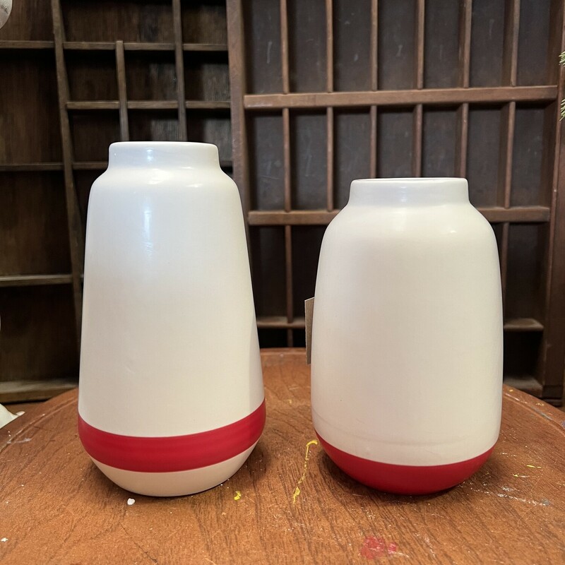 These Red and White vases are perfect for any space and look great with a variety of florals.  These vases are 6 inches and 7 inches tall