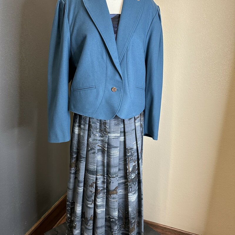 Sailer-Trachten Two Piece Skirt Set. Blazer is 80% wool with adorable buttons. Skirt is pleated with a winter scene print. Both blazer and skirt are lined.