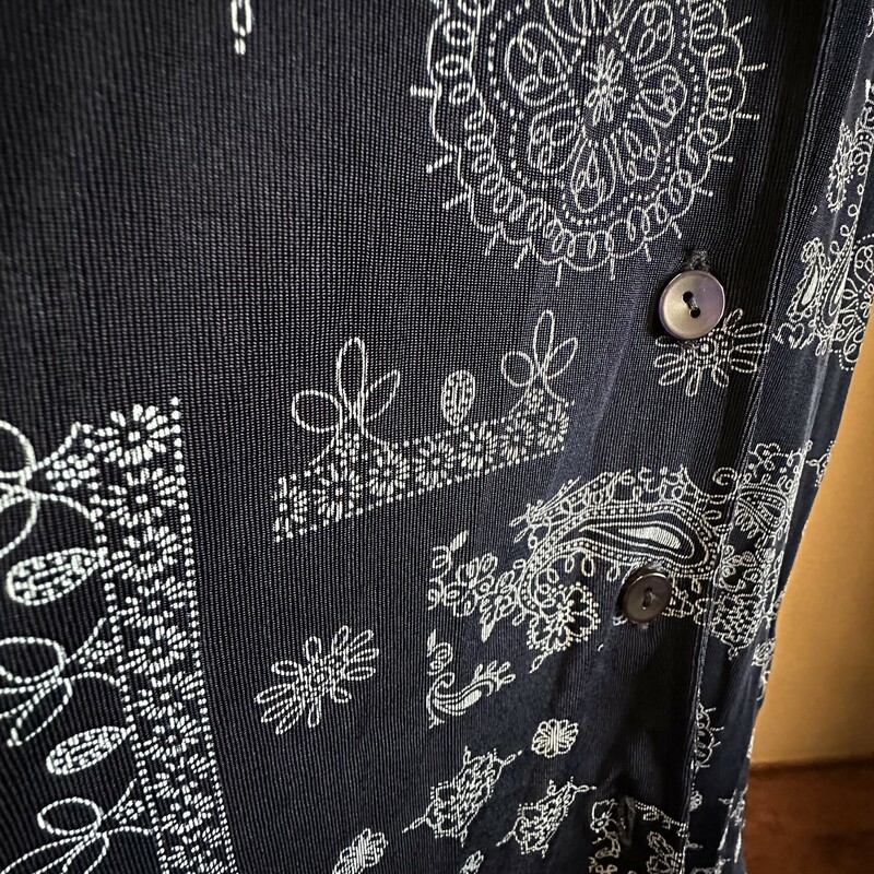 This paisley print button down top is ideal for travel. It doesnt wrinkle or cling.